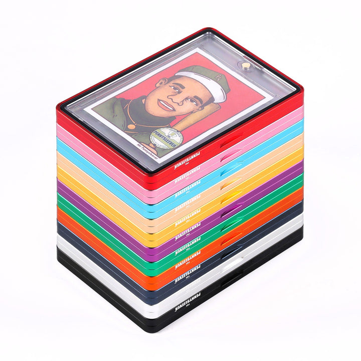 A stack of colorful Color Frame protective 35pt Magnetic Card Holder Aluminum Cases displayed, with one red case on top holding a custom The Pennysleever&