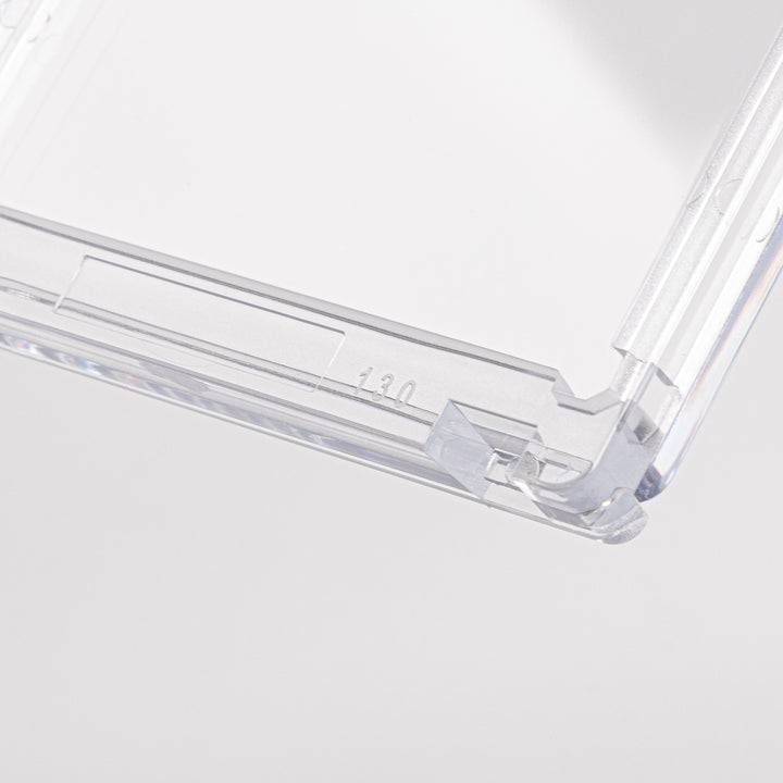Close-up of the corner of a 130 point magnetic card holder against a white background.