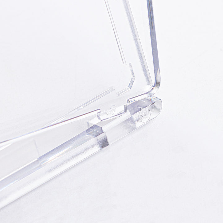 Close up of lower hinge on a 35 point magnetic card holder against a white background.