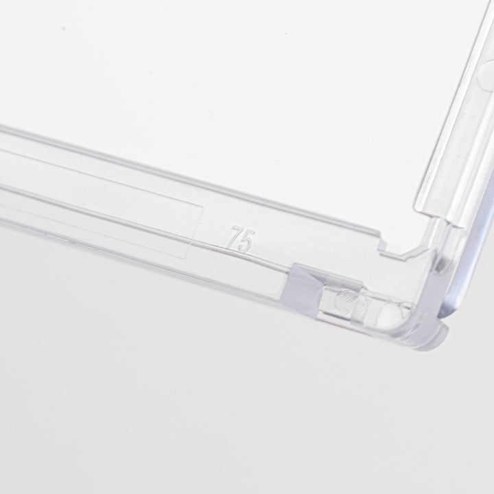 Close-up of bottom right corner of a 75 point magnetic card holder against a white background.