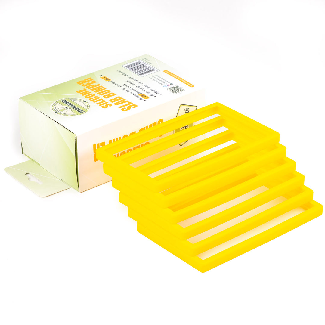 Yellow silicone bumper with packaging on a white background