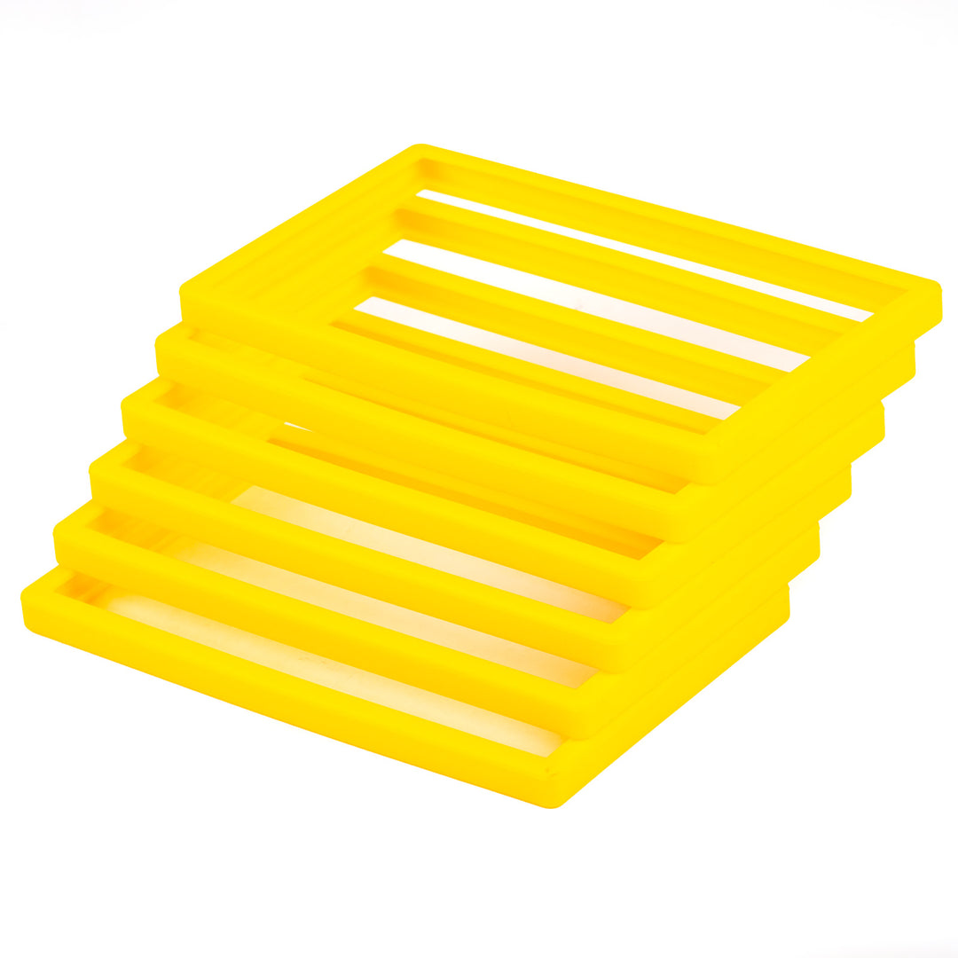 Yellow silicone bumpers on a white background