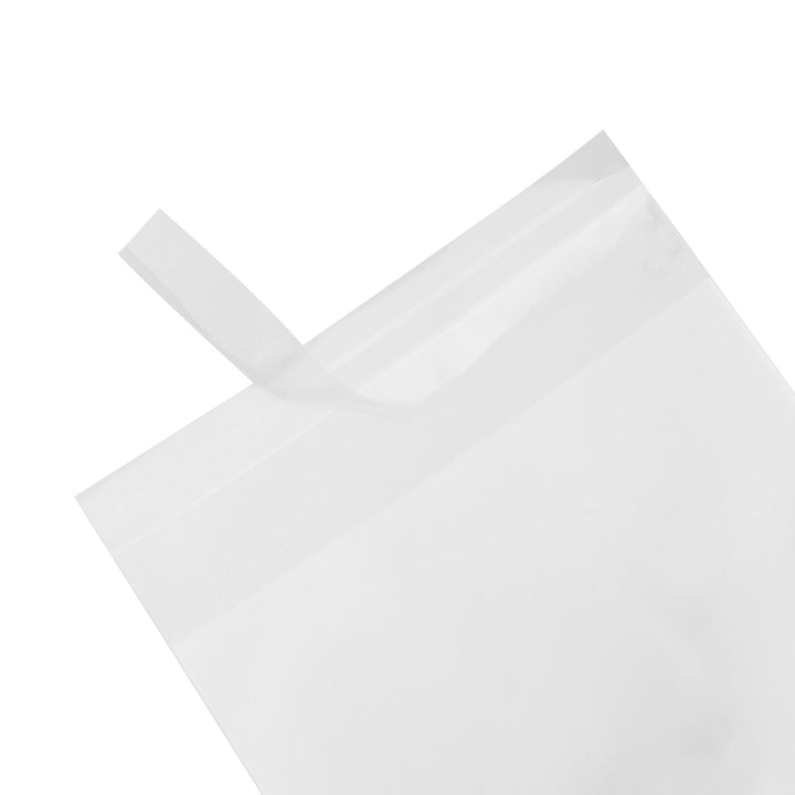 A close-up of a team bag with the resealable adhesive strip half removed.