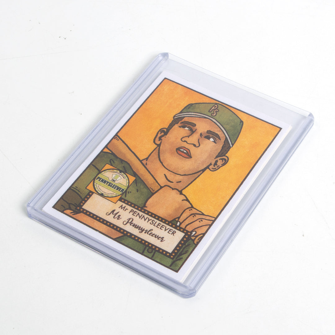Baseball card in a 140 point toploader on a white table.