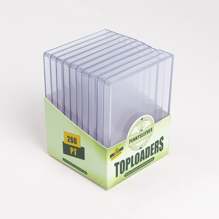 A full pack of The Pennysleever 260 point toploaders, angled on a white table.