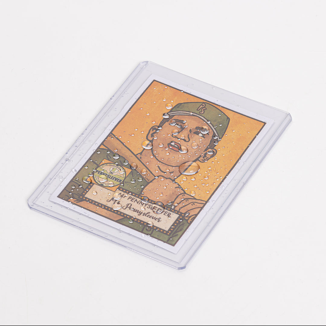 A baseball card in a 35 point toploader, with drops of water on it.