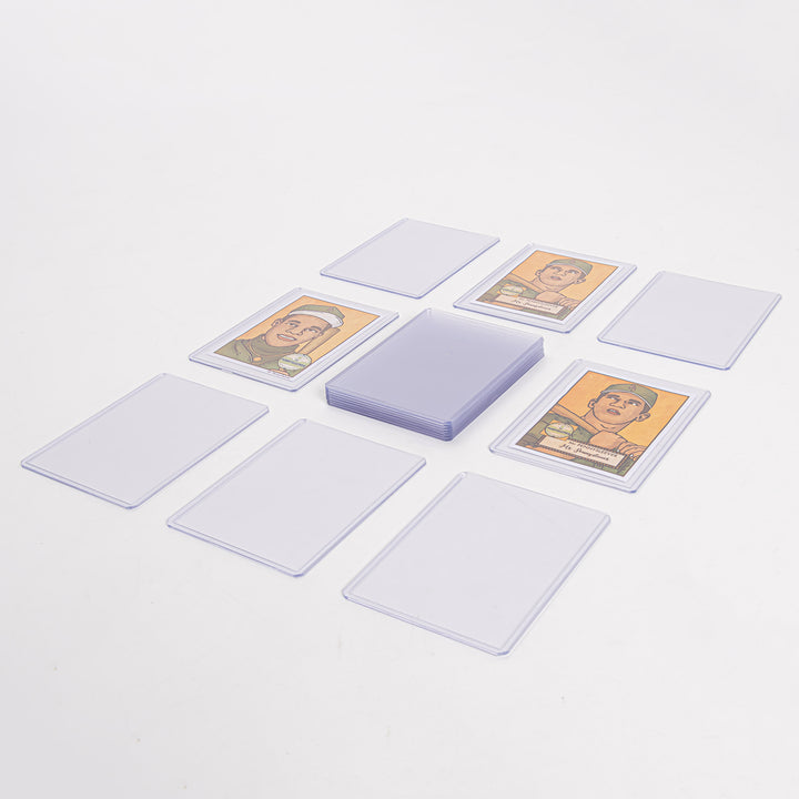 An array of nine 55 point toploaders with baseball cards against a white background.